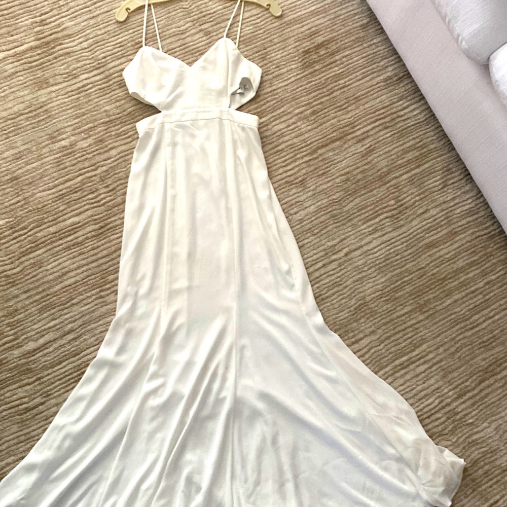 White maxi strapless cut out dress.